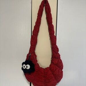 COS red Ripple Croissant Crossbody Bag with Fuzzy Charm